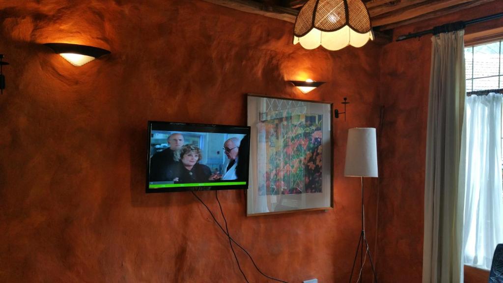 TV a/nebo společenská místnost v ubytování Woodmere Grand Hotel & Serviced Apartments