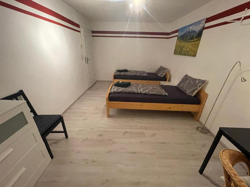 Posezení v ubytování Exklusives Zimmer mit geteiltem Bad und Küche OM