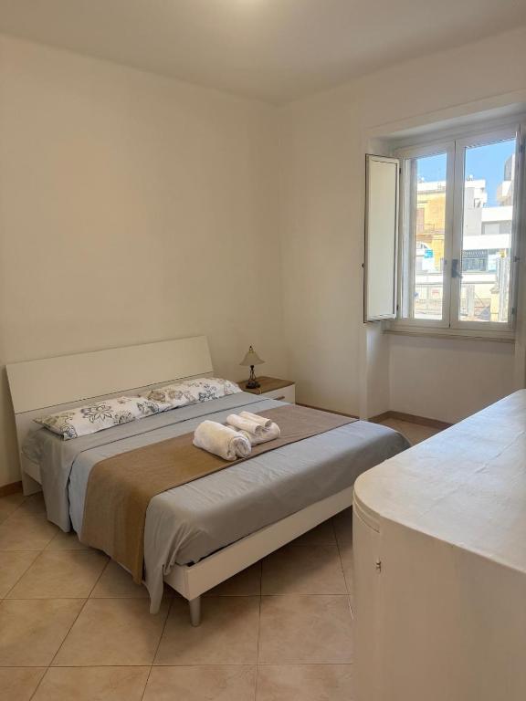 Postel nebo postele na pokoji v ubytování CasadiLollo