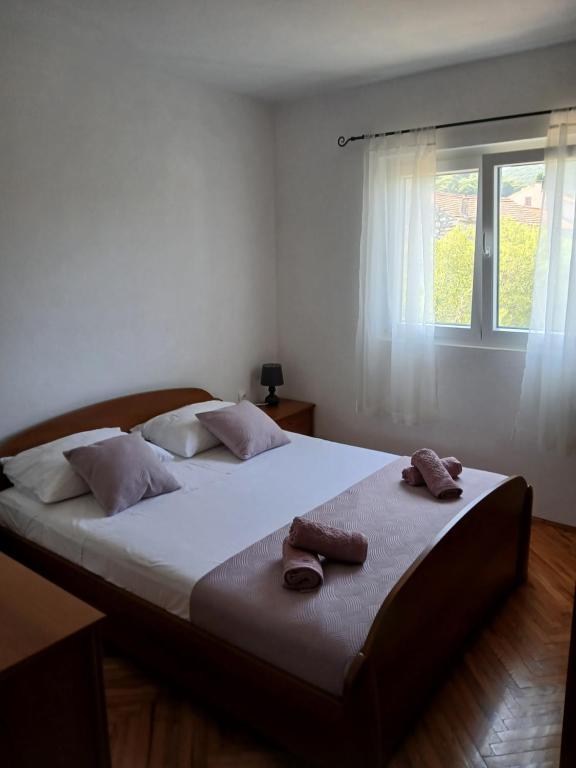 Postel nebo postele na pokoji v ubytování Apartman Maja