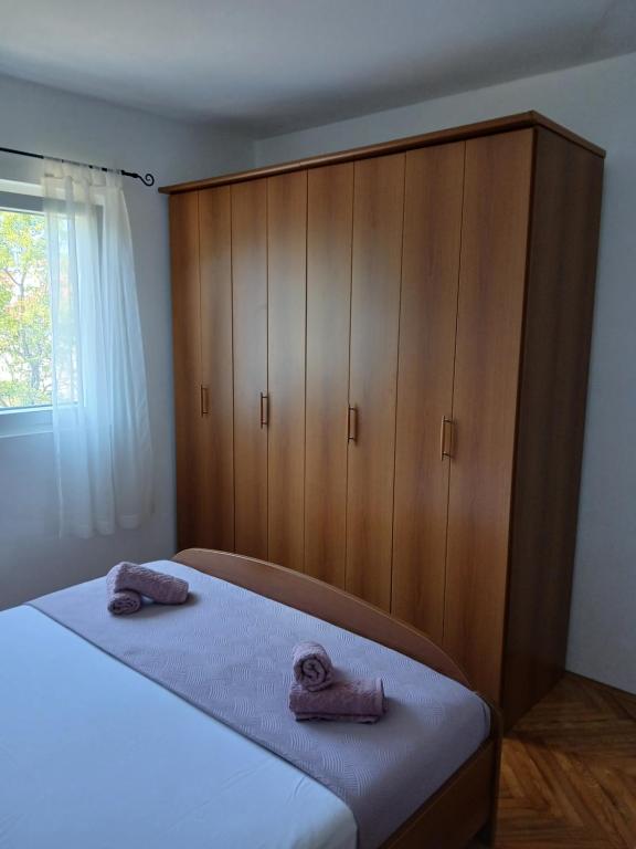 Postel nebo postele na pokoji v ubytování Apartman Maja