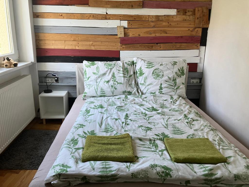 Posteľ alebo postele v izbe v ubytovaní designer fészek