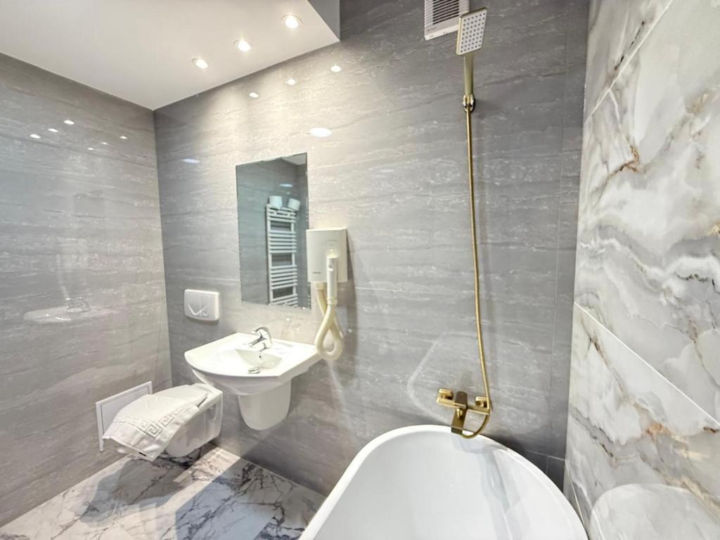 Koupelna v ubytování Hotel Q Art Severus