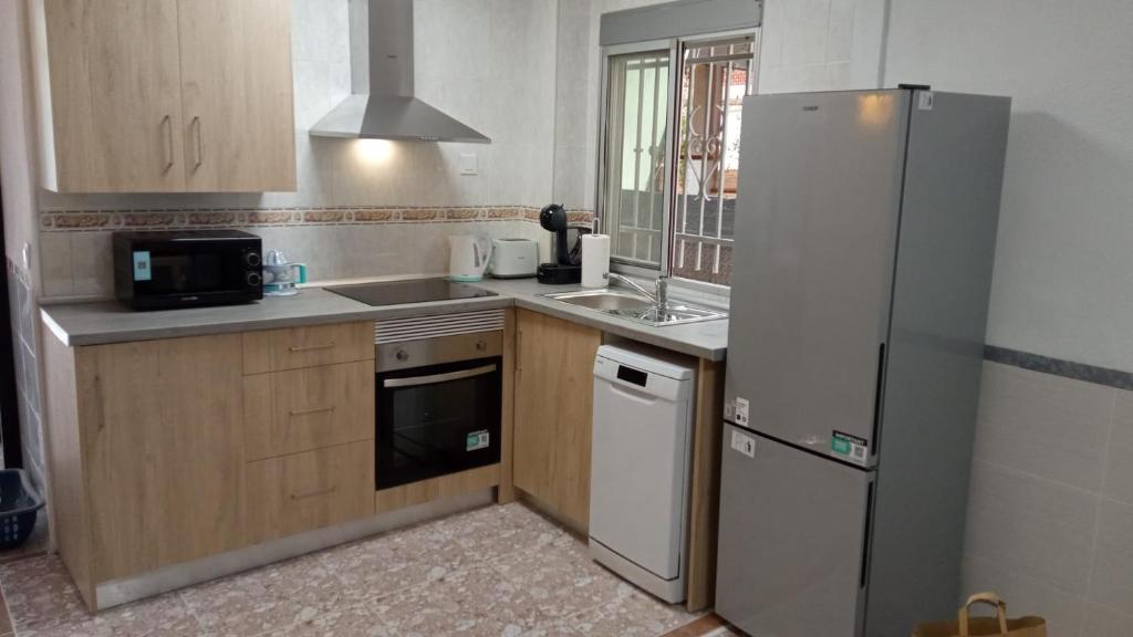 Køkken eller tekøkken på Apartalux Playa Arenal