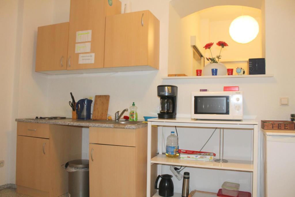 Kuchyň nebo kuchyňský kout v ubytování Pension Central Hostel Berlin