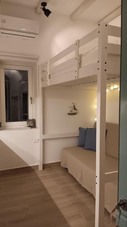 Letto o letti in una camera di Stilvi Milos