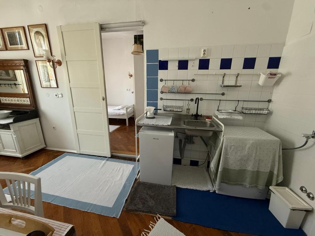 Kuchnia lub aneks kuchenny w obiekcie Guest House Ilicki Plac