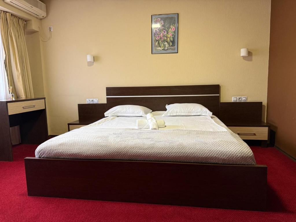 Postel nebo postele na pokoji v ubytování Hotel Q Art Severus