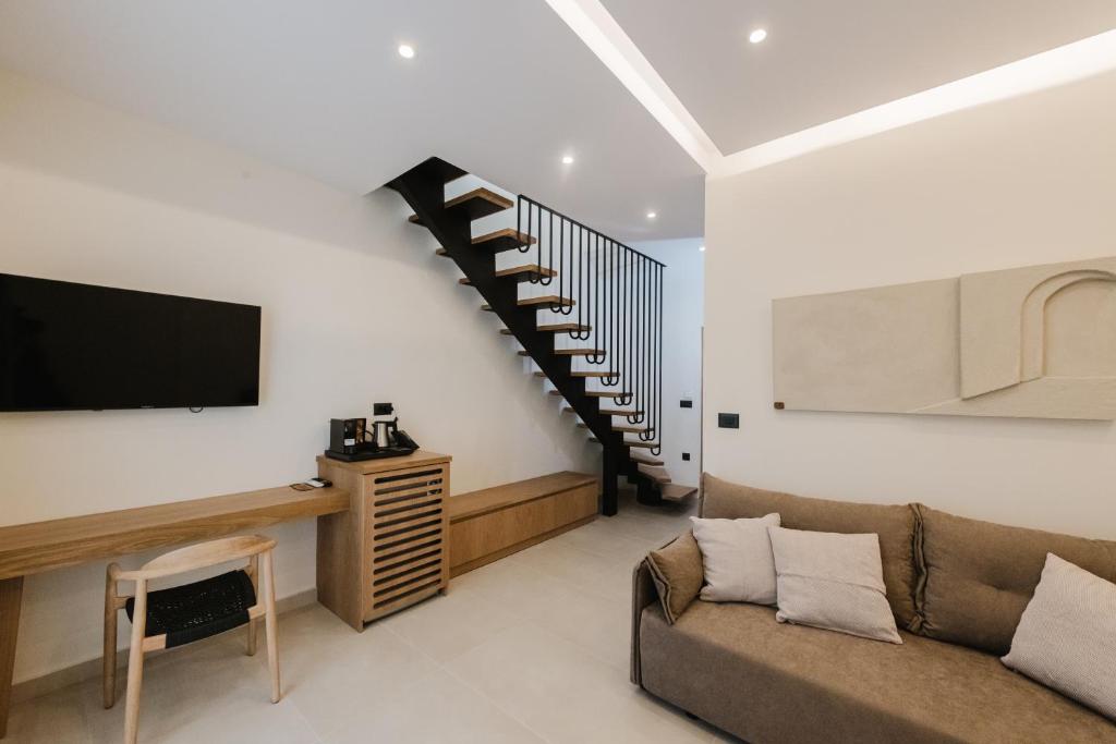 TV a/nebo společenská místnost v ubytování Evexia boutique hotel & Spa