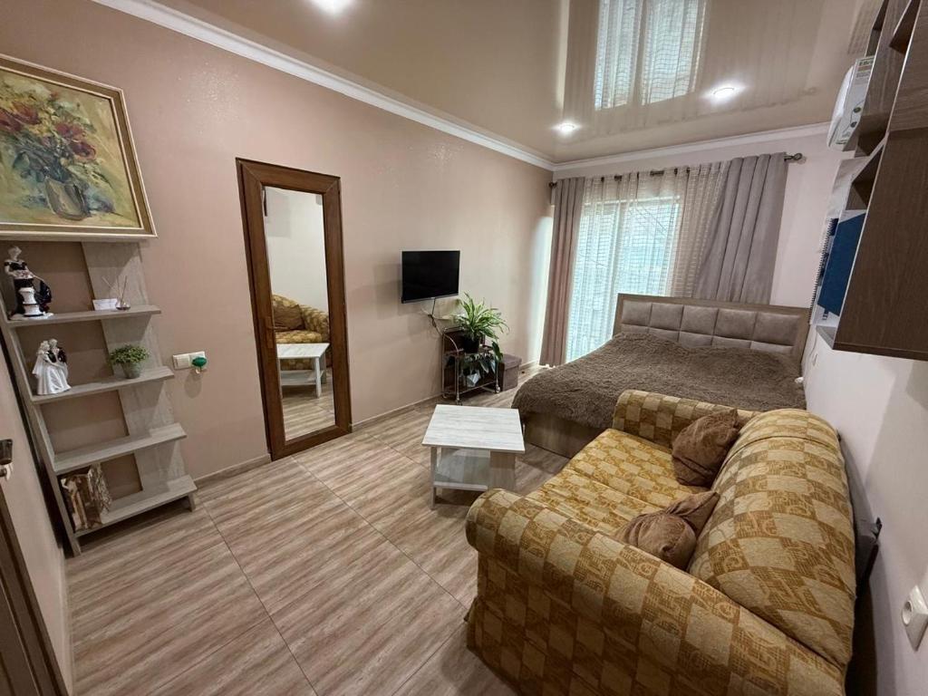 TV a/nebo společenská místnost v ubytování Room 1