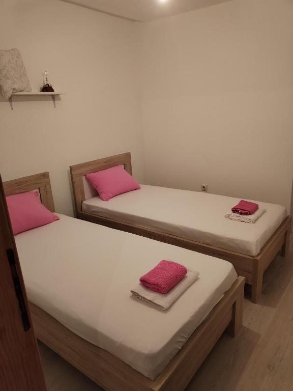Postel nebo postele na pokoji v ubytování Guest house Gorica