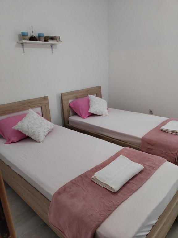 Postel nebo postele na pokoji v ubytování Guest house Gorica