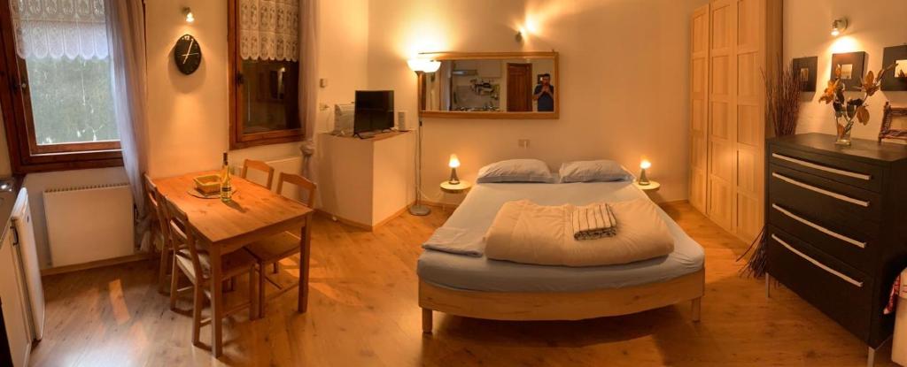 Postel nebo postele na pokoji v ubytování Piccolo Rifugio di Foppolo