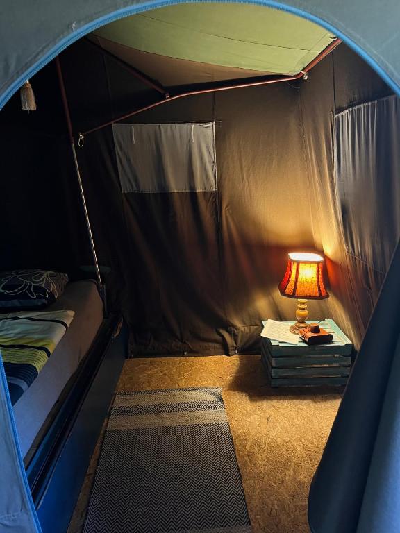 Postel nebo postele na pokoji v ubytování Nomads Glamp