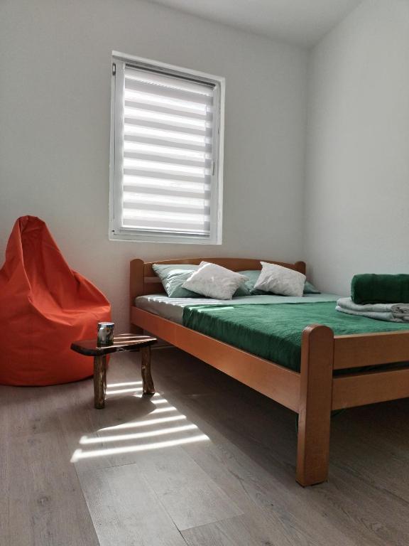 Postel nebo postele na pokoji v ubytování Guest house Gorica