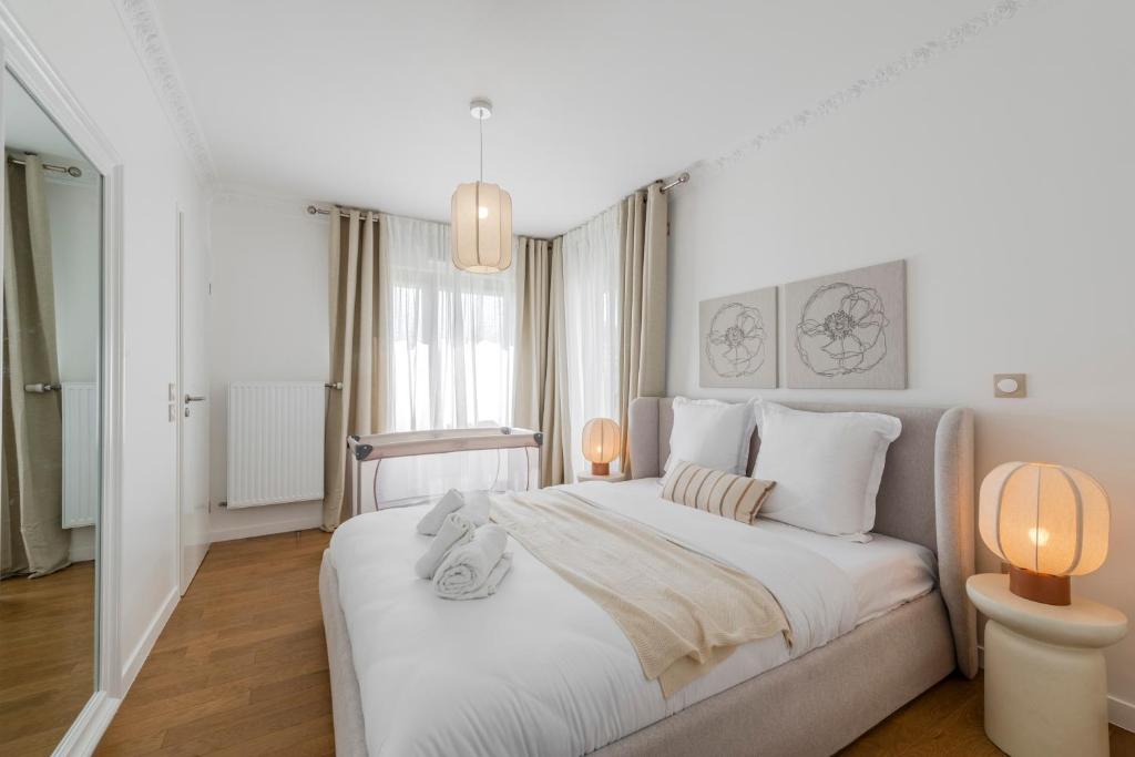 Postel nebo postele na pokoji v ubytování Penthouse Duplex Disneyland Paris - 10 pers - 4 Ch - 10 min