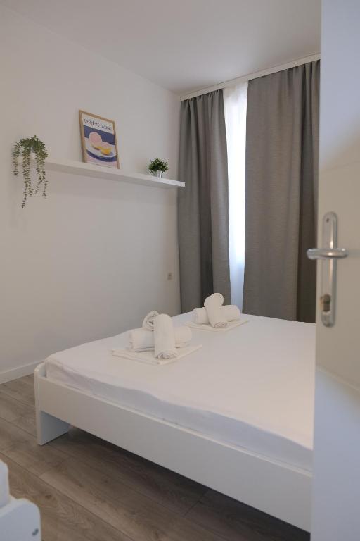 Posteľ alebo postele v izbe v ubytovaní Sesar Apartments Krk - No. 2 Vinko