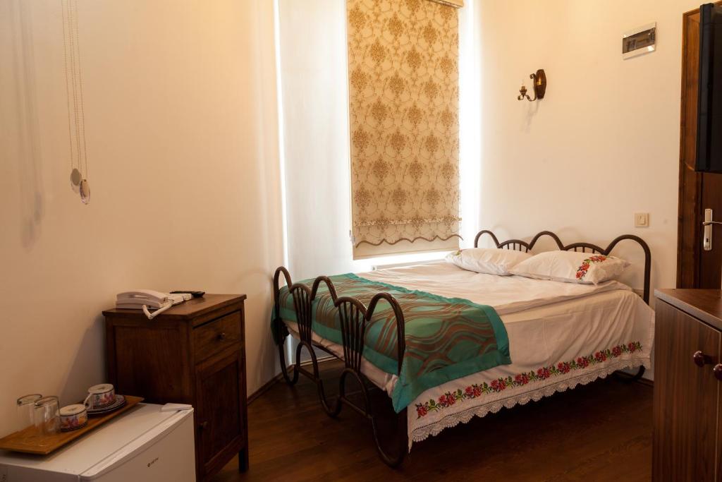 Postel nebo postele na pokoji v ubytování Lal Hotel Bursa