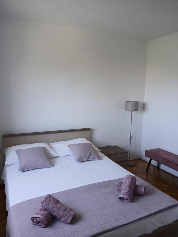 Postel nebo postele na pokoji v ubytování Apartman Maja