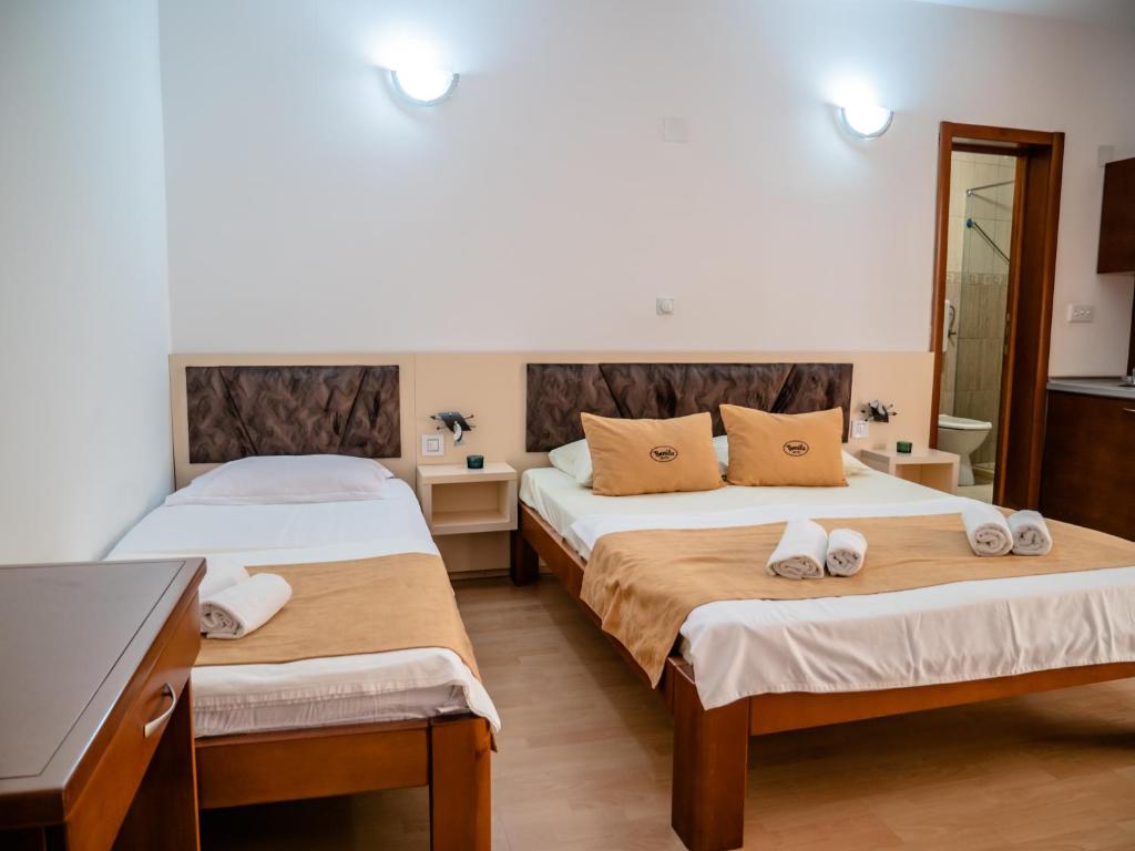 Postel nebo postele na pokoji v ubytování Apartments Bonita