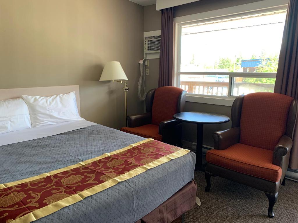 Postel nebo postele na pokoji v ubytování Rondo Motel