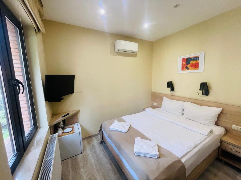 TV a/nebo společenská místnost v ubytování Hotel Brick House