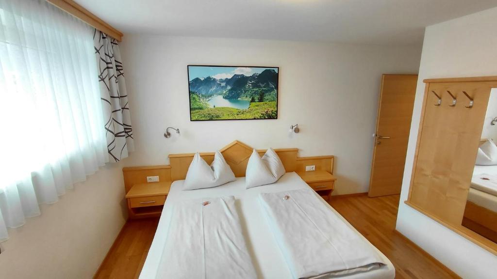 Giường trong phòng chung tại Haus Lienbacher