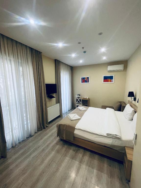 Postel nebo postele na pokoji v ubytování Hotel Brick House