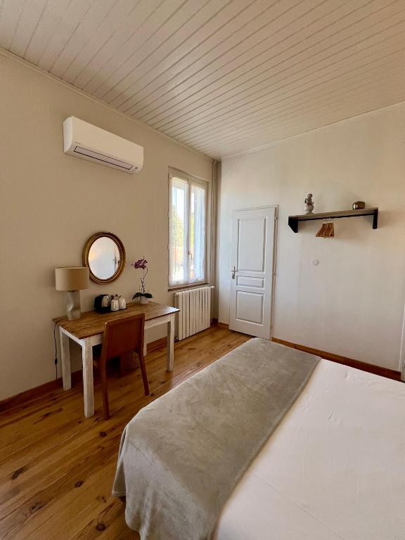 Postel nebo postele na pokoji v ubytování L'Estanquet Bed and Breakfast pdj offert