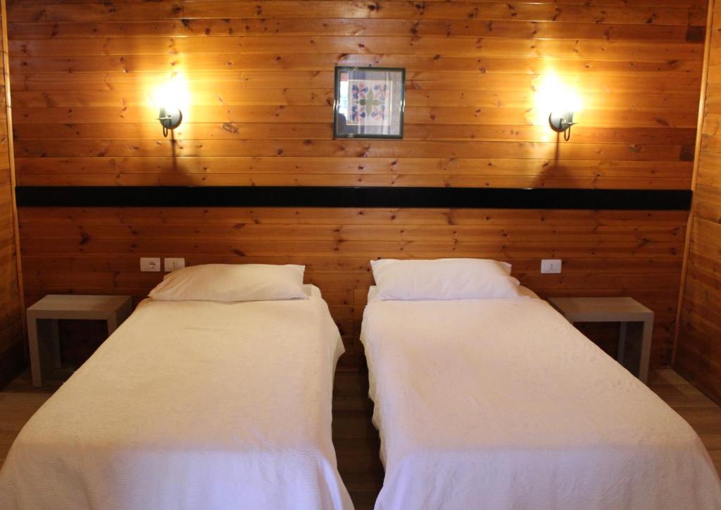 Postel nebo postele na pokoji v ubytování Agroturizem Bylis