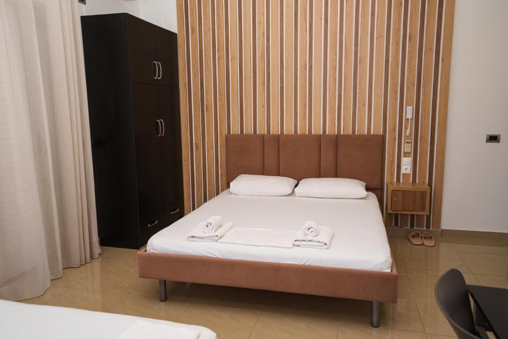 Postel nebo postele na pokoji v ubytování Hotel Piazza