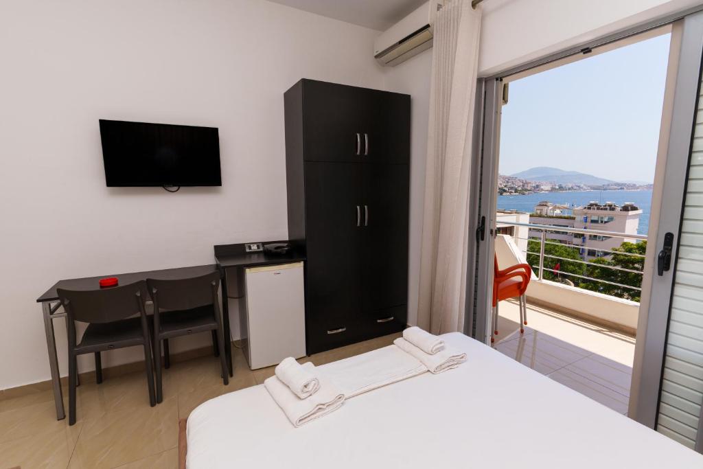 TV a/nebo společenská místnost v ubytování Hotel Piazza