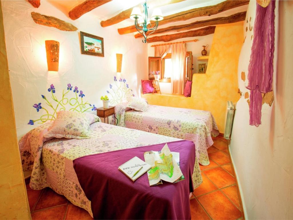 Postel nebo postele na pokoji v ubytování Beautiful holiday home in Laroya with shared pool