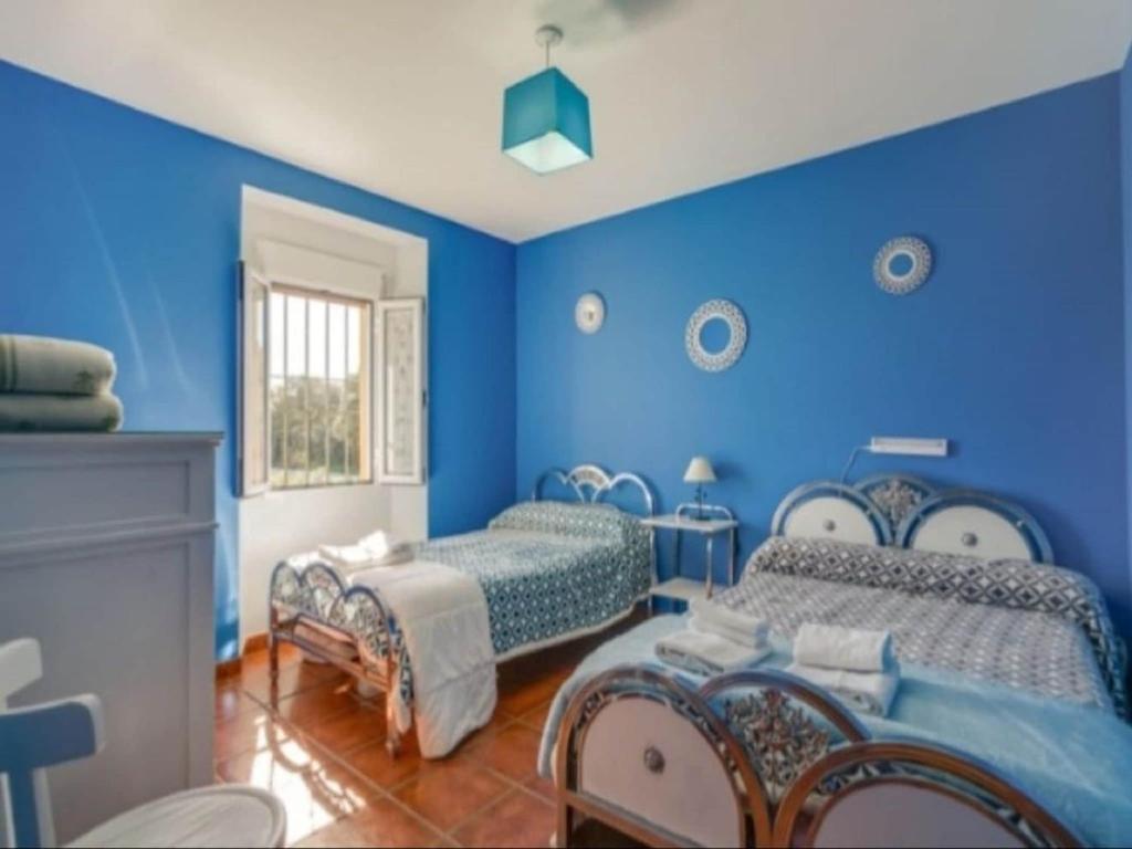 Posteľ alebo postele v izbe v ubytovaní Holiday Home in Villanueva with Private Pool
