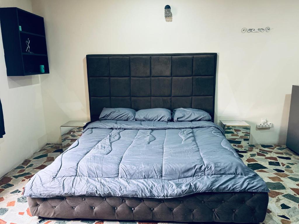 Postel nebo postele na pokoji v ubytování Uno One Airport Inn