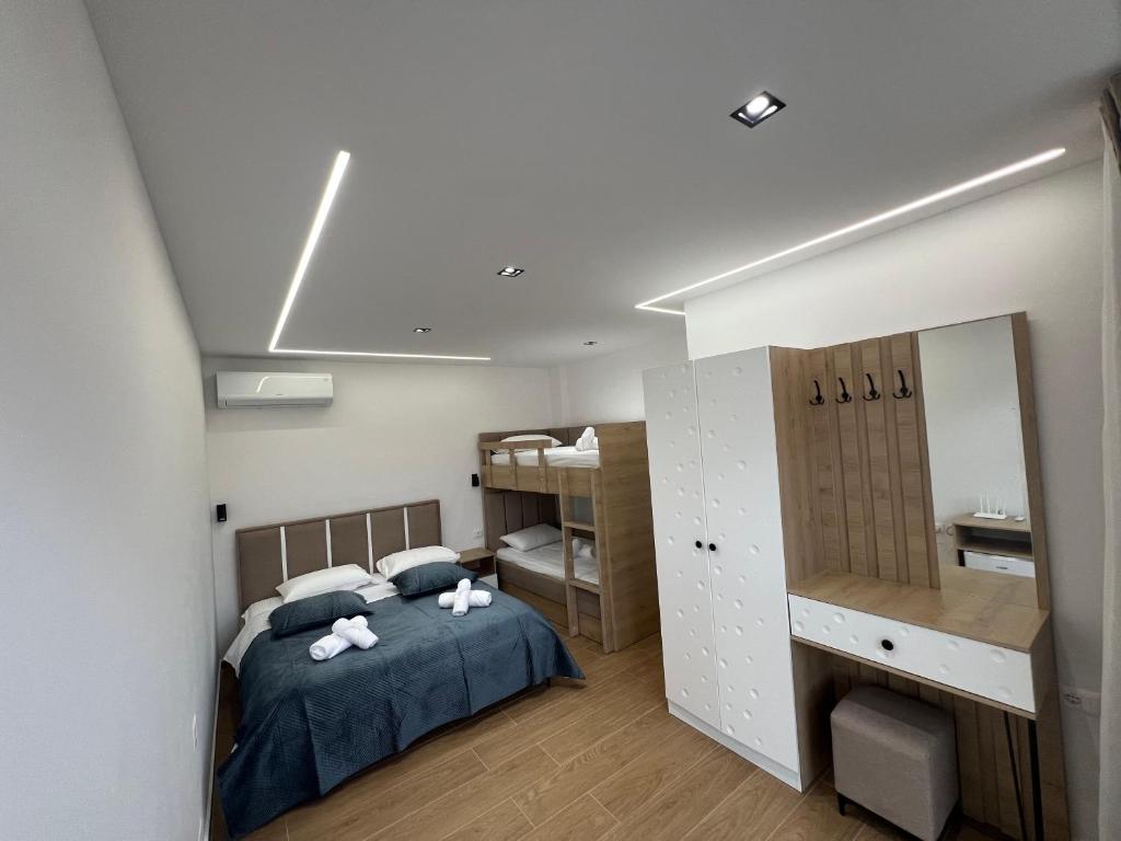 Postel nebo postele na pokoji v ubytování Adriatik Guesthouse