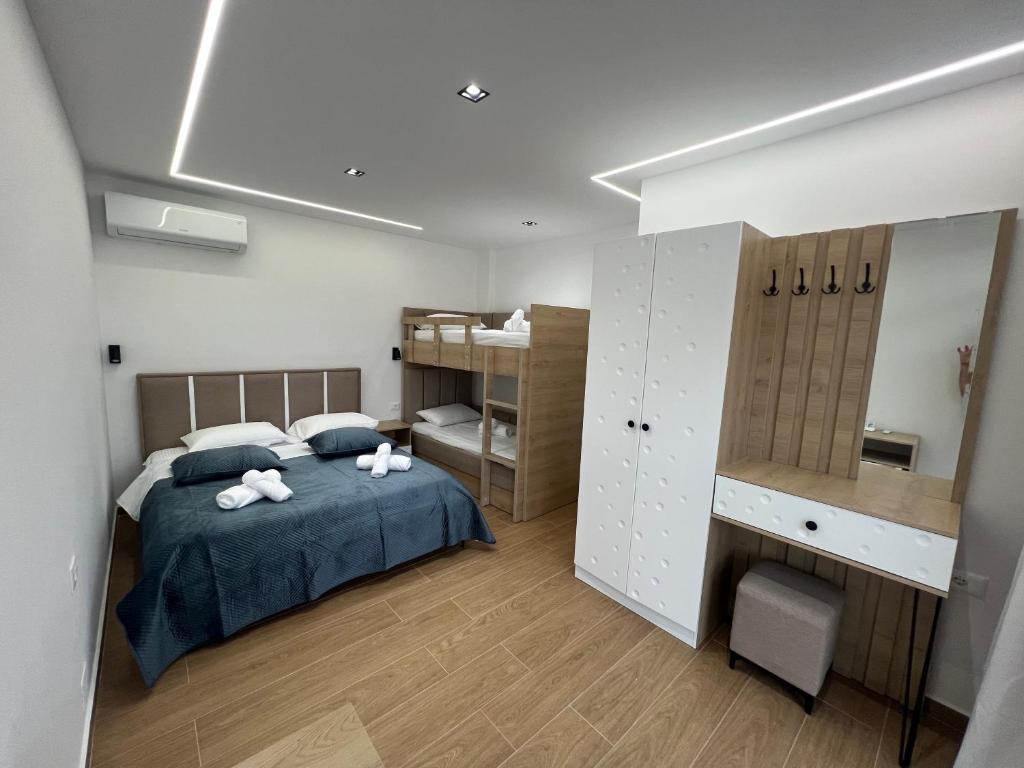 Postel nebo postele na pokoji v ubytování Adriatik Guesthouse