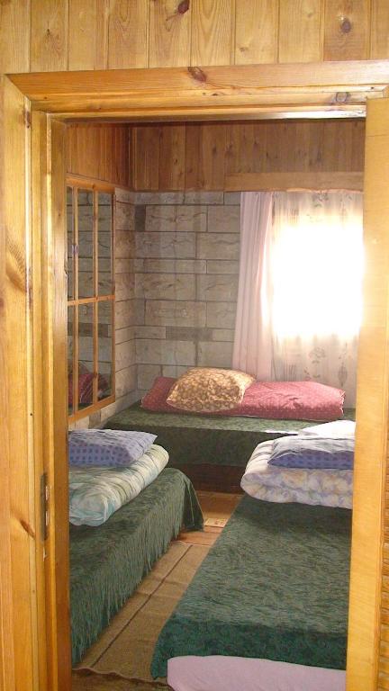 Postel nebo postele na pokoji v ubytování Tammekännu Holiday House