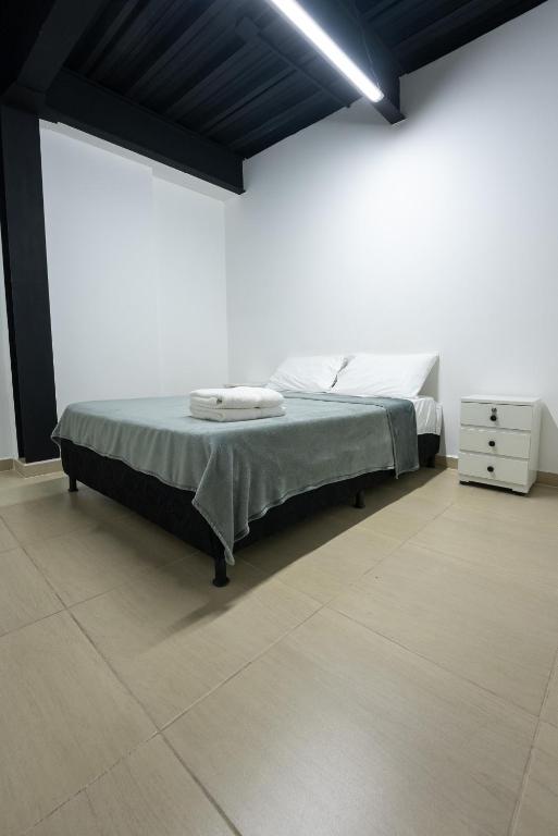 Postel nebo postele na pokoji v ubytování Apartahotel Tonchala