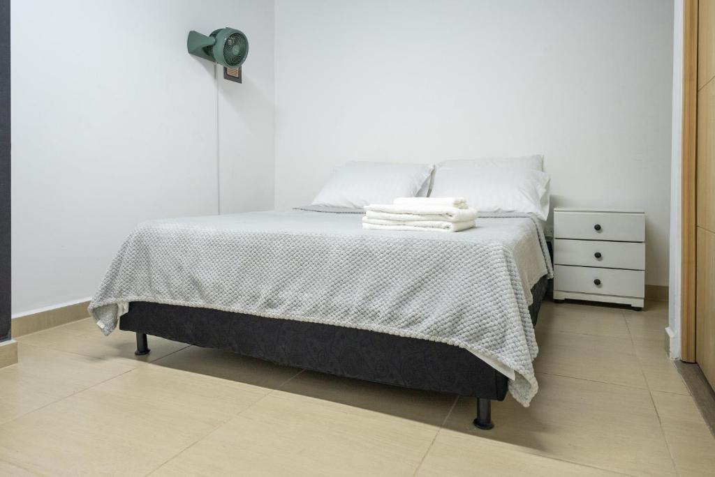 Postel nebo postele na pokoji v ubytování Apartahotel Tonchala