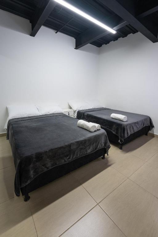 Postel nebo postele na pokoji v ubytování Apartahotel Tonchala