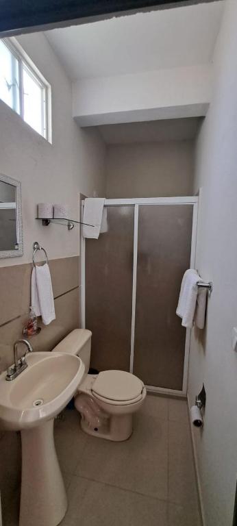 Koupelna v ubytování Tres Palmas Departamentos