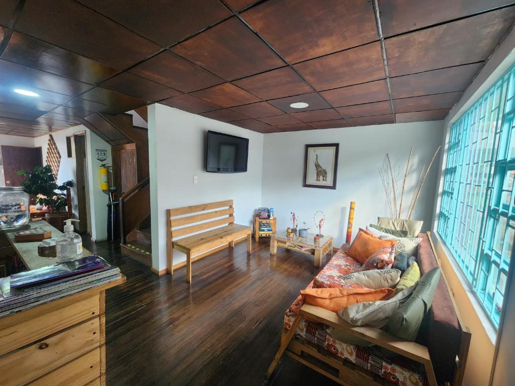 Posezení v ubytování Hostal Triangulo del Café