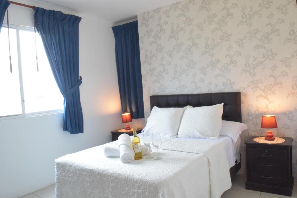 Postel nebo postele na pokoji v ubytování Hotel Valeritos