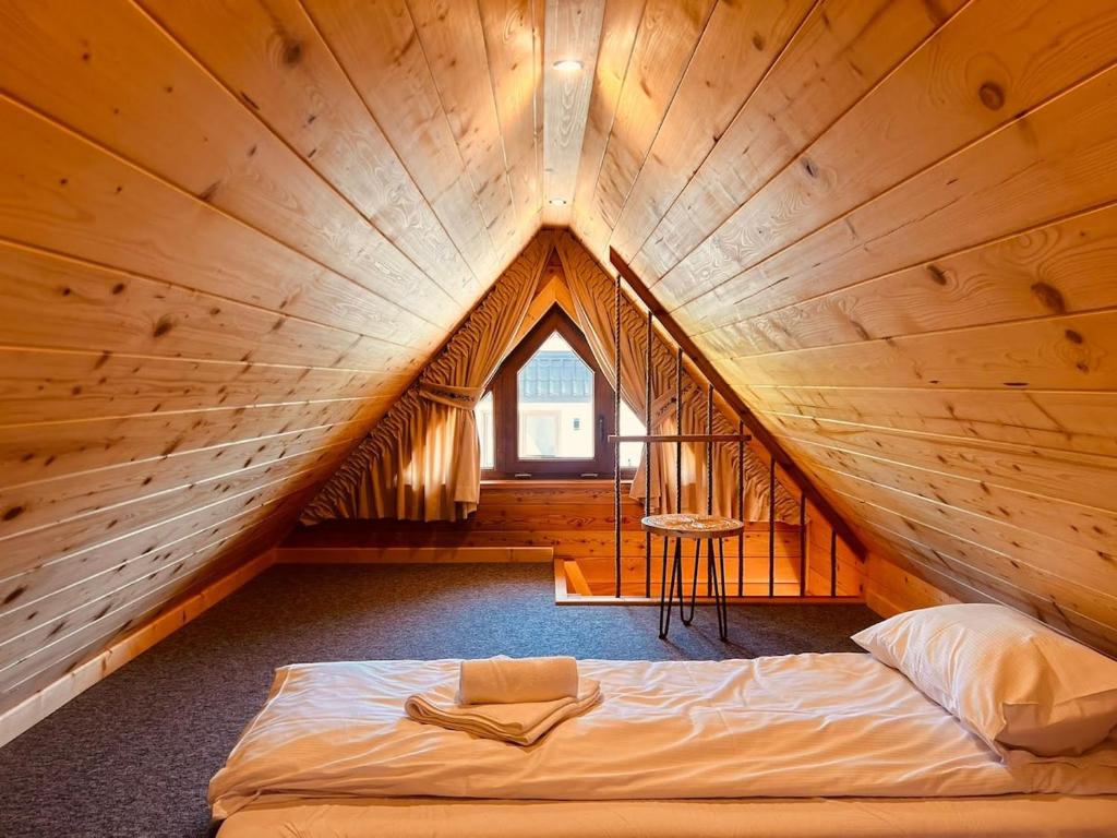 Ένα ή περισσότερα κρεβάτια σε δωμάτιο στο Stella Haus