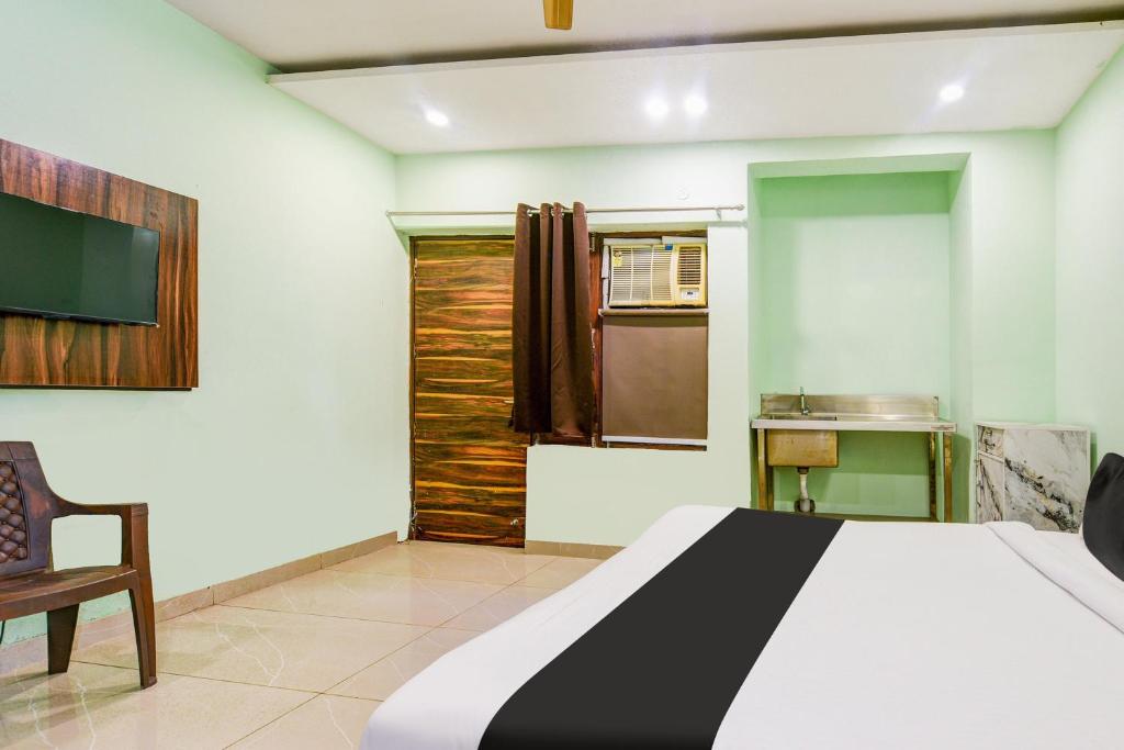 Postel nebo postele na pokoji v ubytování Hotel O Ridge Way Stays