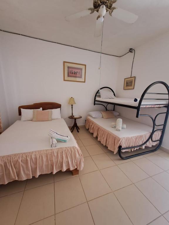 Postel nebo postele na pokoji v ubytování Hotel Georgi