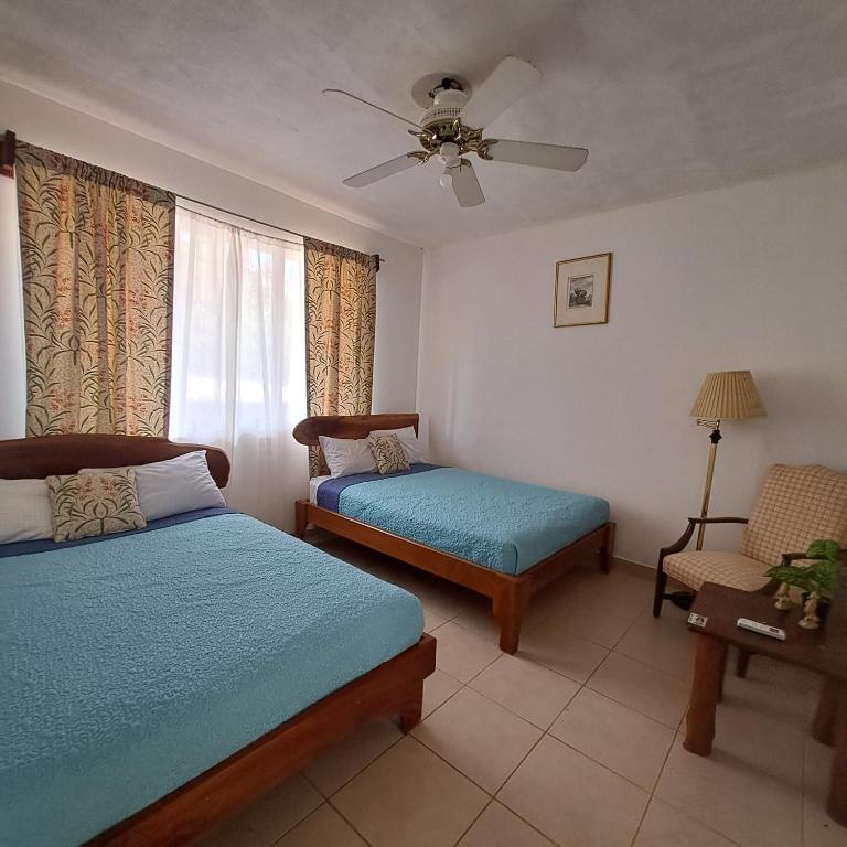 Postel nebo postele na pokoji v ubytování Hotel Georgi