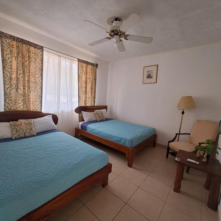Postel nebo postele na pokoji v ubytování Hotel Georgi