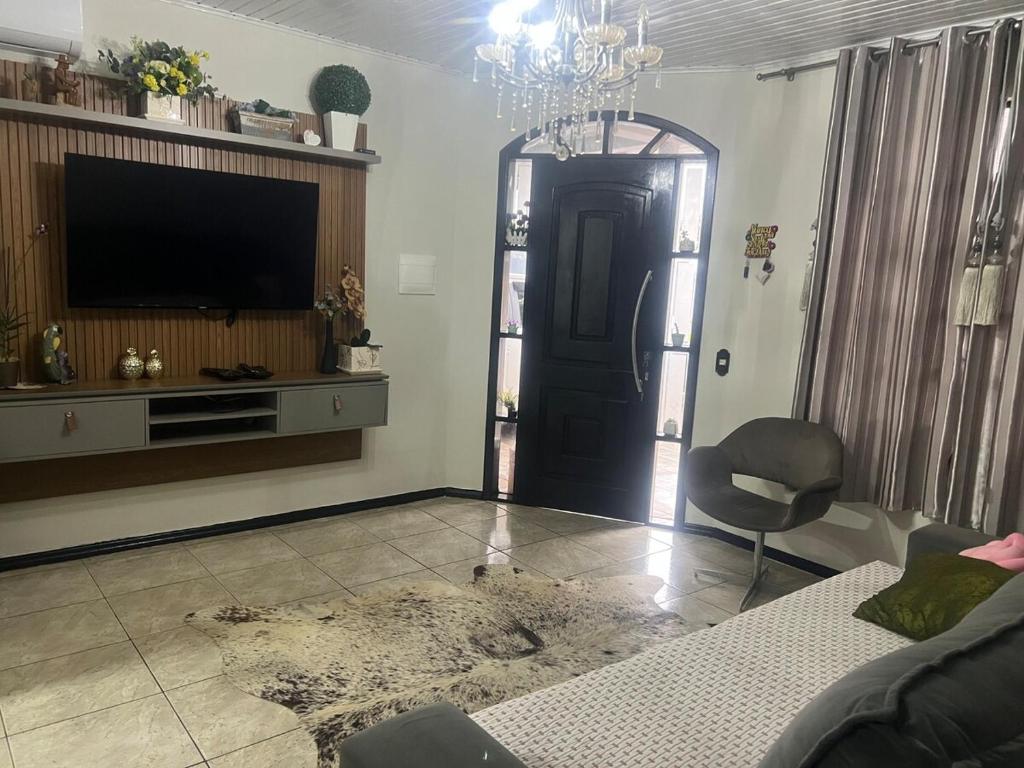 Un televizor și/sau centru de divertisment la Casa da Mari